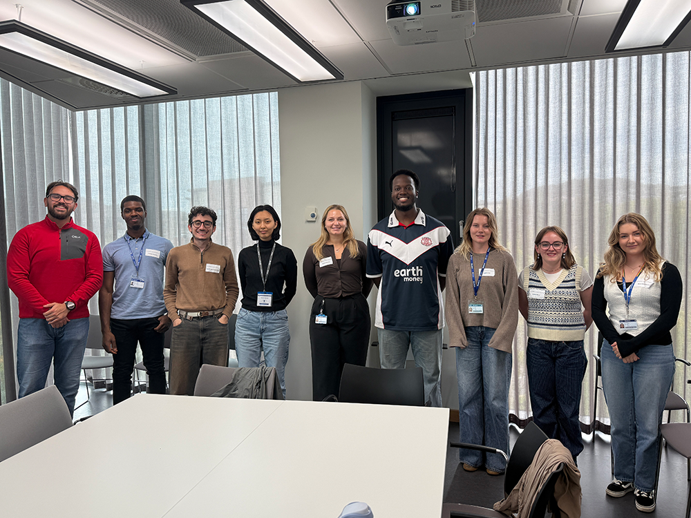 From L>R: Sadik Elshani (PhD representative), Tomisin Owolabi, Guilherme Rondi Fernandes, Xiuhe (Julia) Chong, Grace Werosta, Oluwaseun Afolayan, Sophie Coe, Caitlin Shaw and Rose Winchester. (Missing from the picture – Cenyujia Wang)