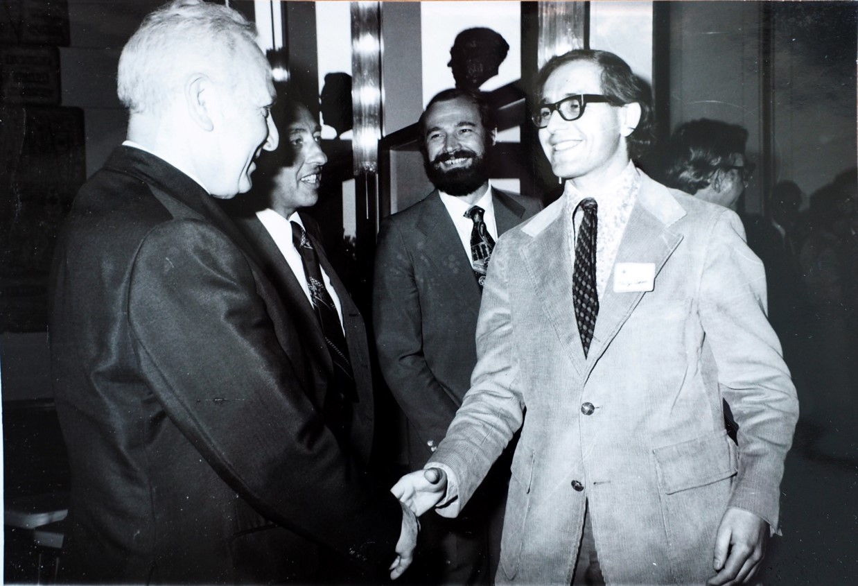 The President’s Palace in Jerusalem 1978. Edmond Fischer (second from left) introducing Philip Cohen wearing Eddy’s jacket (right) to President Efraim Katzir. Second from the right is Ludwig Heilmeyer Jr, who was also a postdoctoral fellow in the Fischer lab at the same time as Philip.