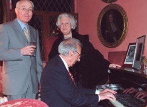 Eddy playing the piano at Glamis Castle in 2005, with Mary, the Countess of Strathmore, and Philip.