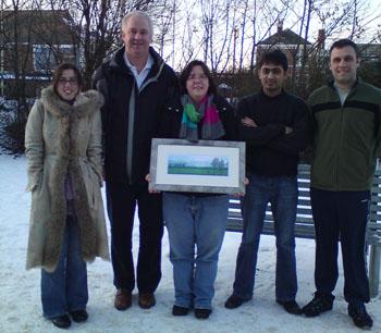 Emma Carrick pictured with the rest of Nick Morrice's group showing off one of her post viva presents. Congratulations Dr Carrick